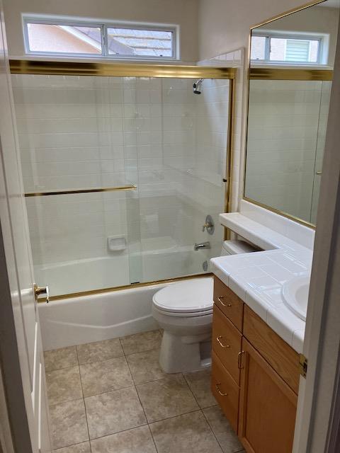 2157 West Rue St Michel Fresno, CA 93711 - Photo 16 of 22 a bathroom with a sink a toilet and shower