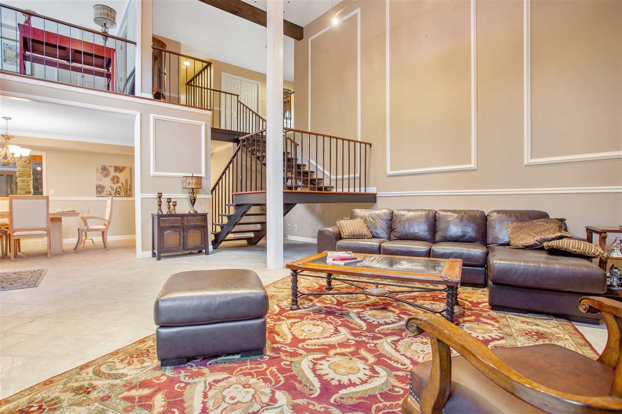 5115 Brookview Road Rockford, IL 61107 - Photo 3 of 21 a living room with furniture and a rug