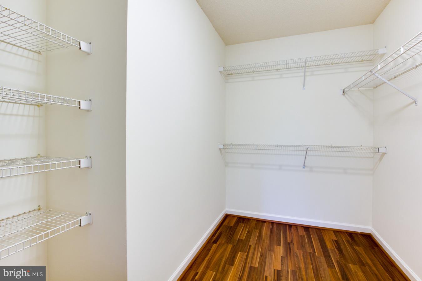 12016 Taliesin Place, Unit 34 Reston, VA 20190 - Photo 14 of 30 a view of a room with racks on the wall