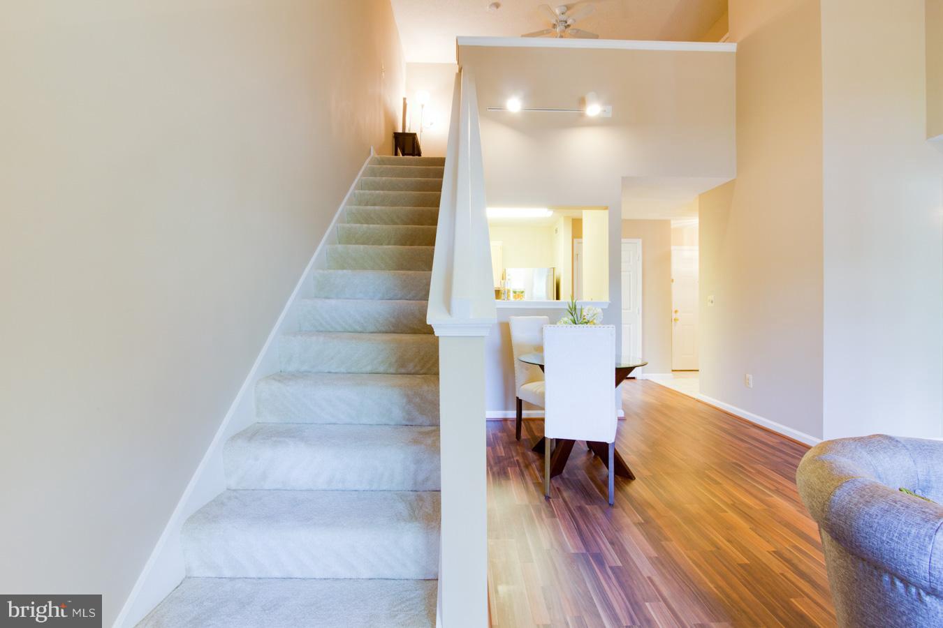 12016 Taliesin Place, Unit 34 Reston, VA 20190 - Photo 18 of 30 a view of entryway and hall with wooden floor