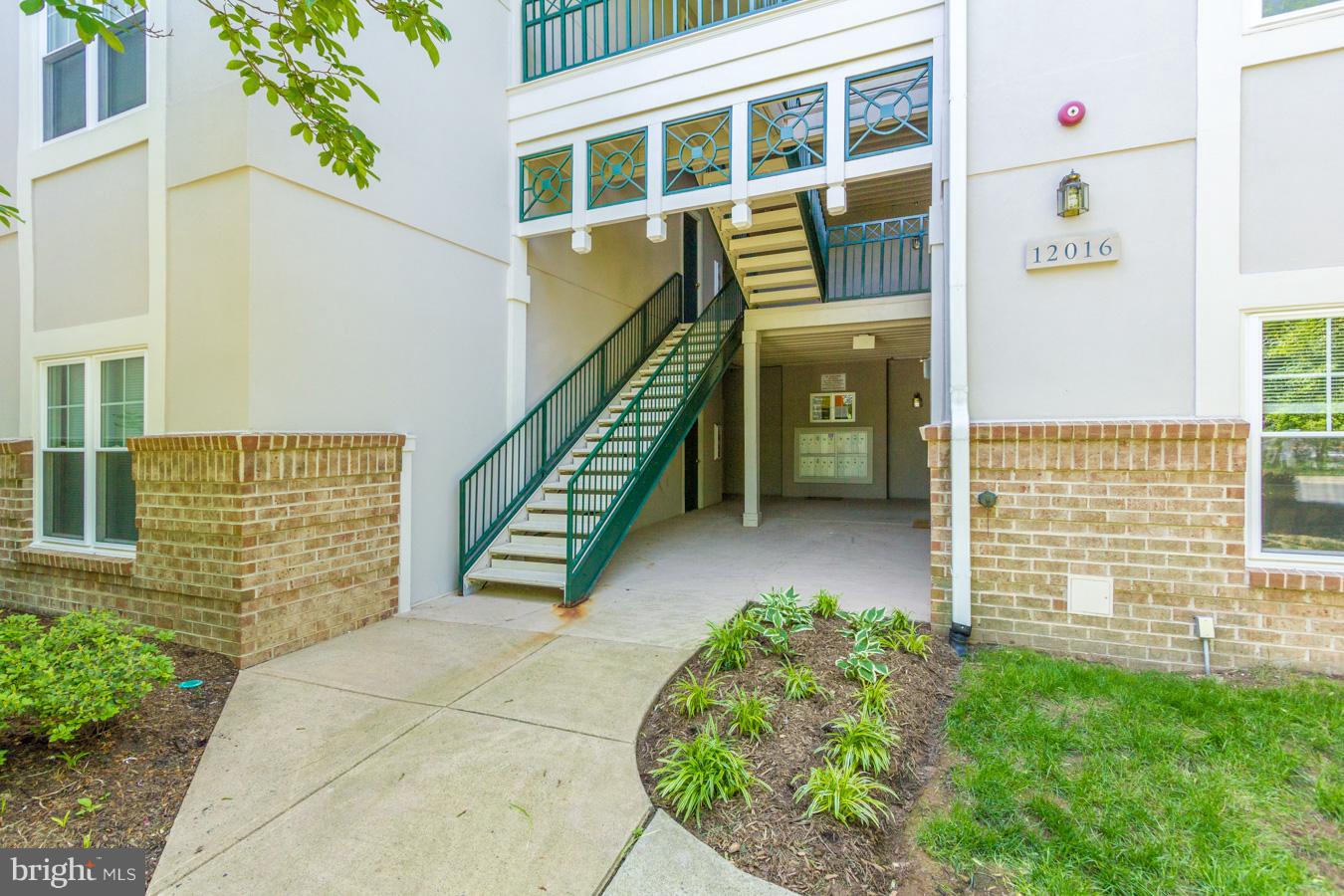 12016 Taliesin Place, Unit 34 Reston, VA 20190 - Photo 3 of 30 a view of an entryway with a house