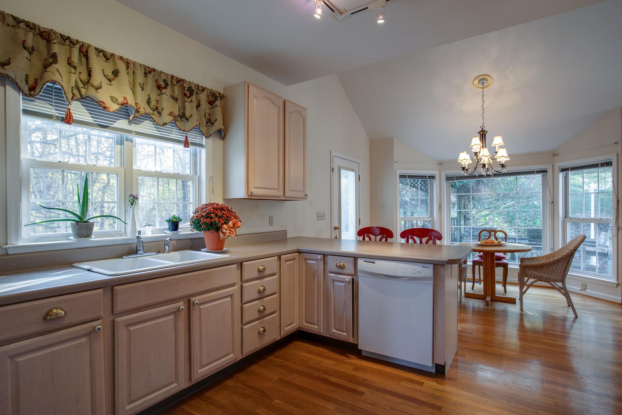 4498 Dyke Bennett Road Franklin, TN 37064 - Photo 21 of 29 a kitchen that has a sink and cabinets