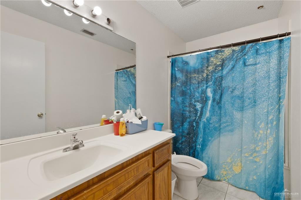 300 North Coyote Boulevard La Joya, TX 78560 - Photo 11 of 24 a bathroom with a sink and a mirror