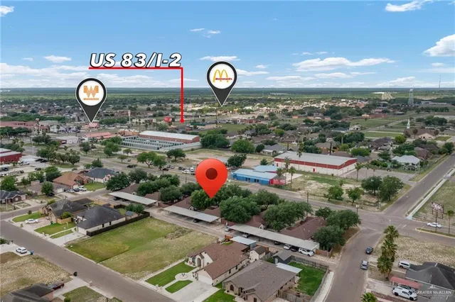 a view of a area with table and chairs