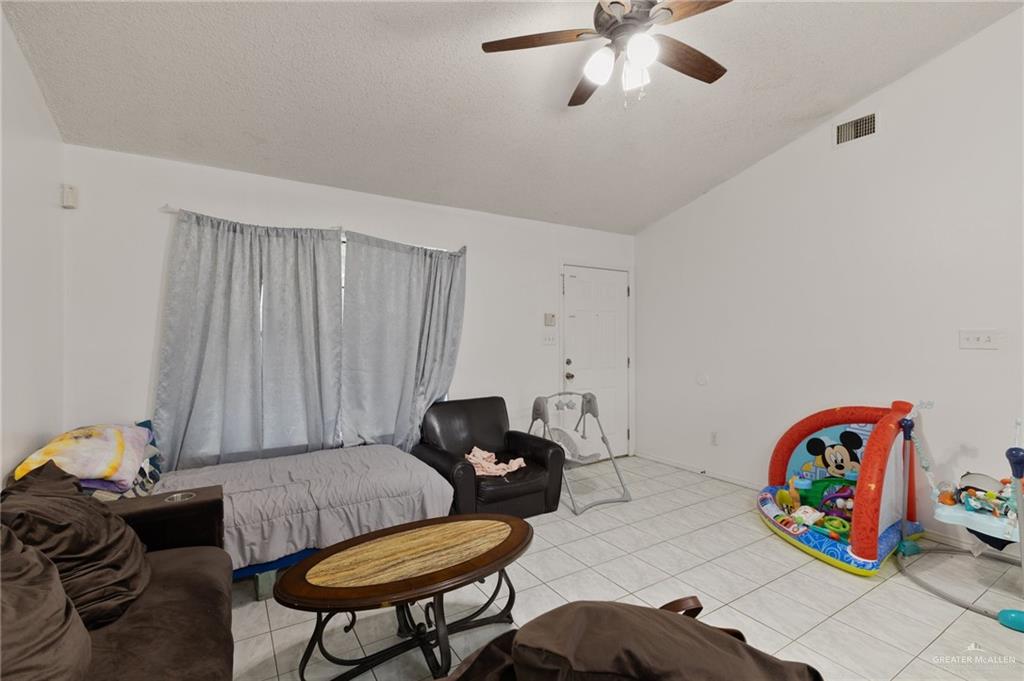 300 North Coyote Boulevard La Joya, TX 78560 - Photo 5 of 24 a living room with furniture and a table