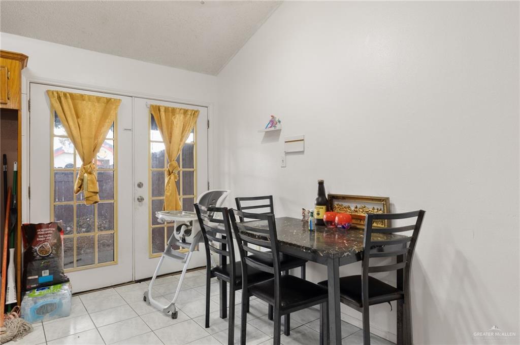 300 North Coyote Boulevard La Joya, TX 78560 - Photo 7 of 24 a view of a dining room with furniture and a window