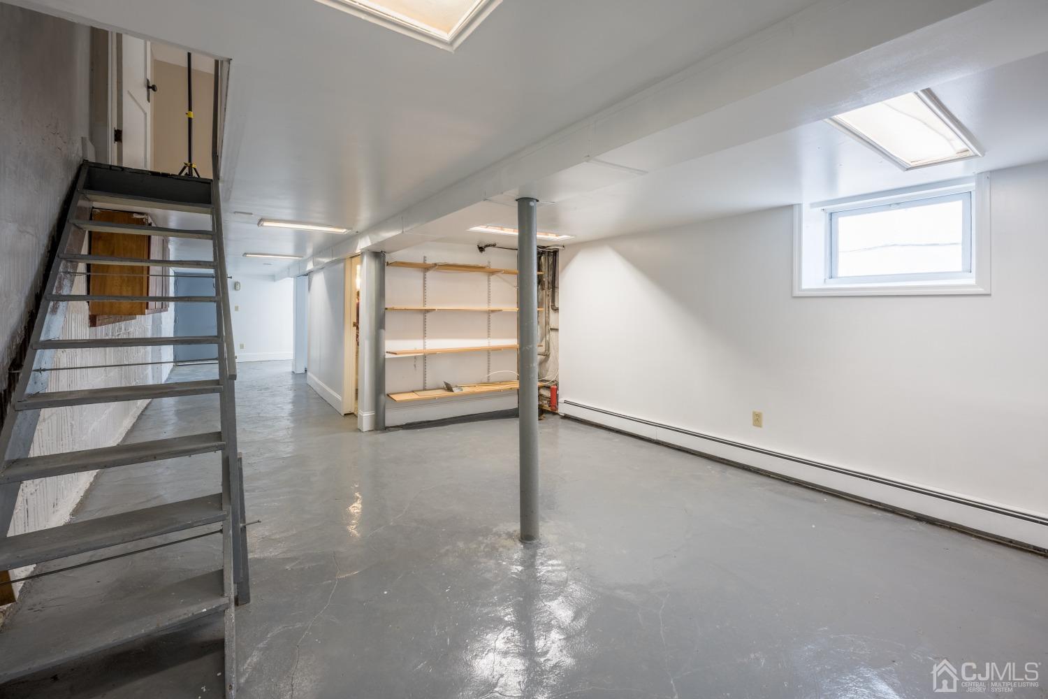 120 Rector Street Perth Amboy, NJ 08861 - Photo 15 of 34 a view of a room with racks on the wall