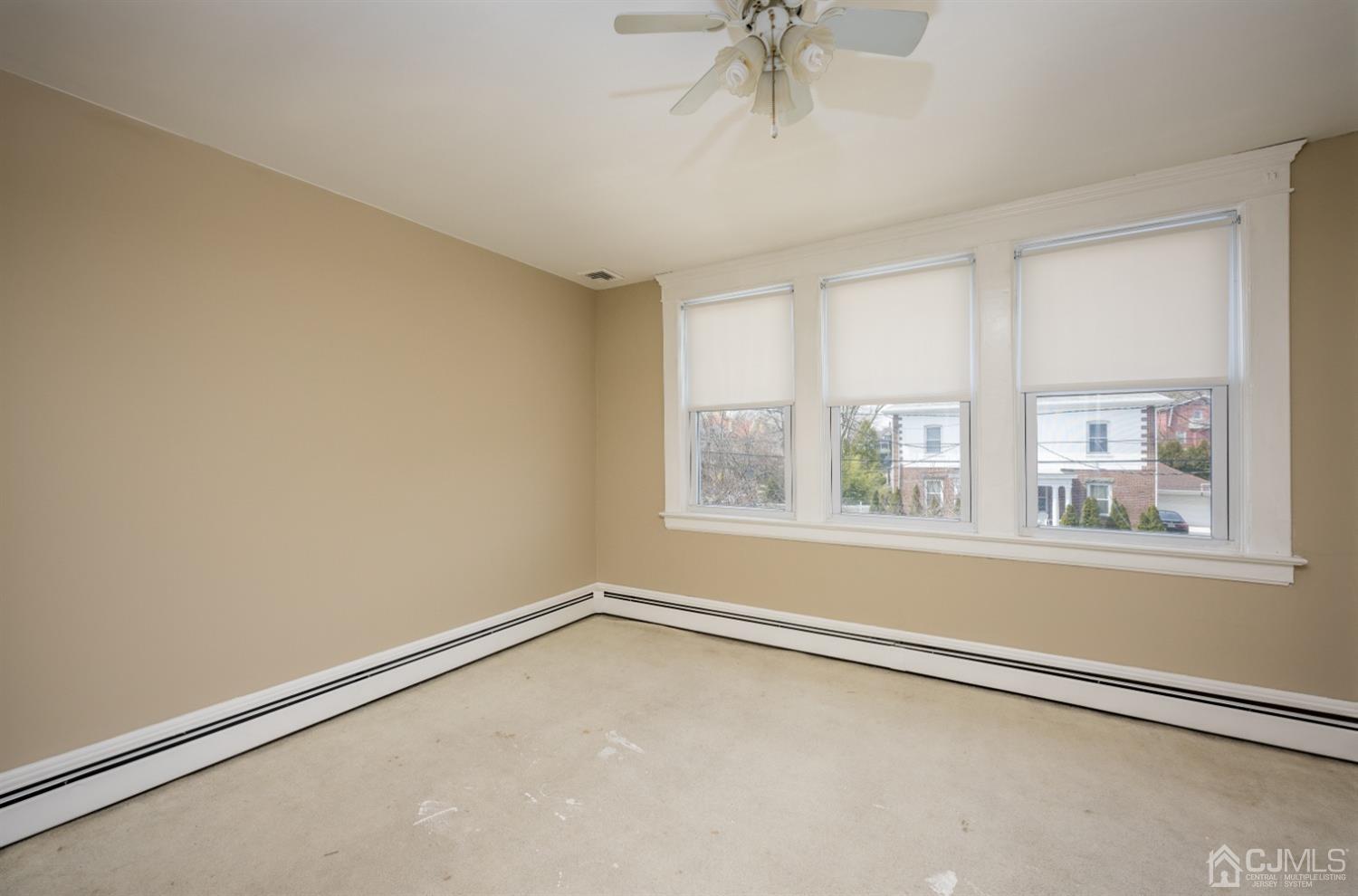 120 Rector Street Perth Amboy, NJ 08861 - Photo 22 of 34 an empty room with a window