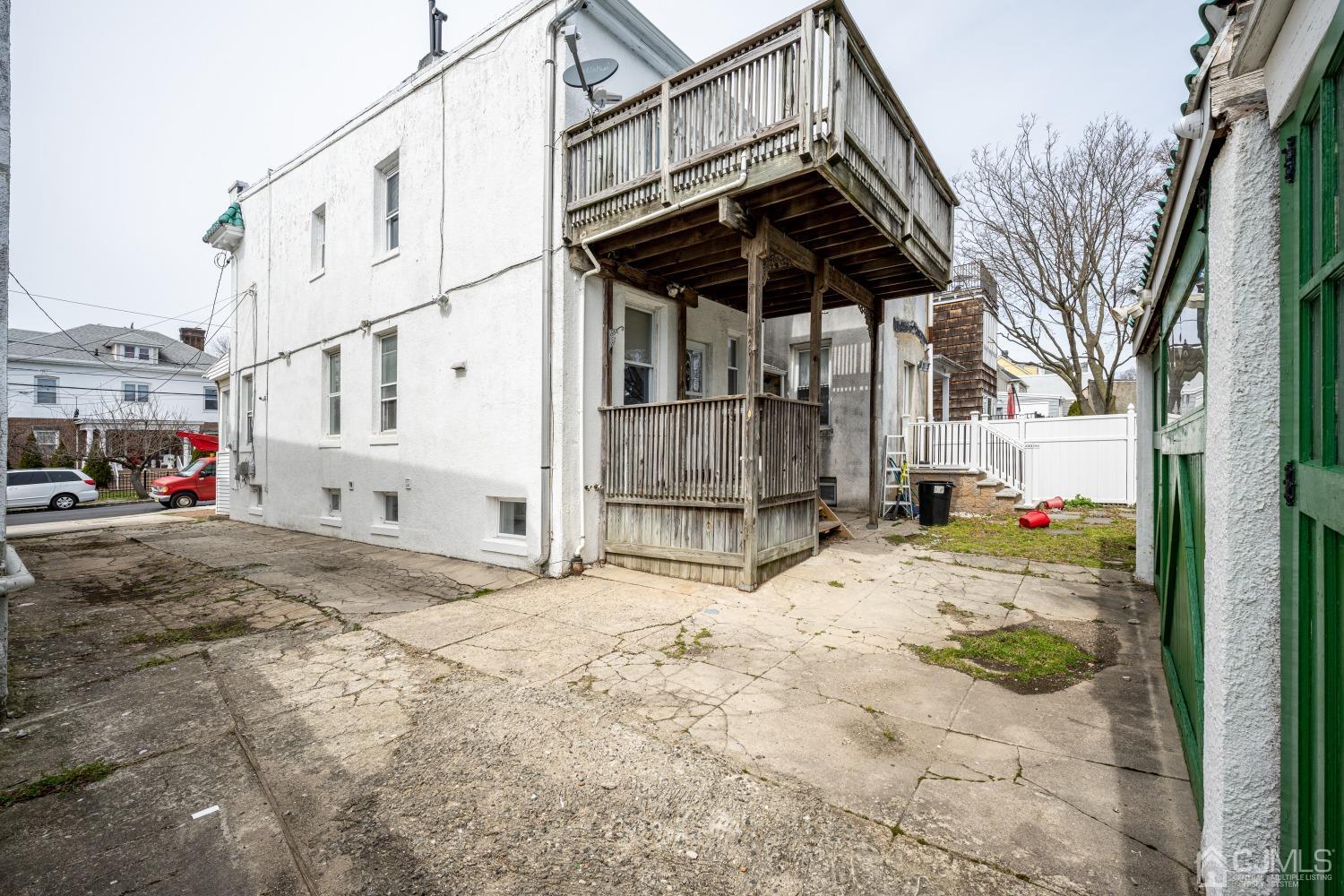 120 Rector Street Perth Amboy, NJ 08861 - Photo 33 of 34 a view of a house with a snow on the road