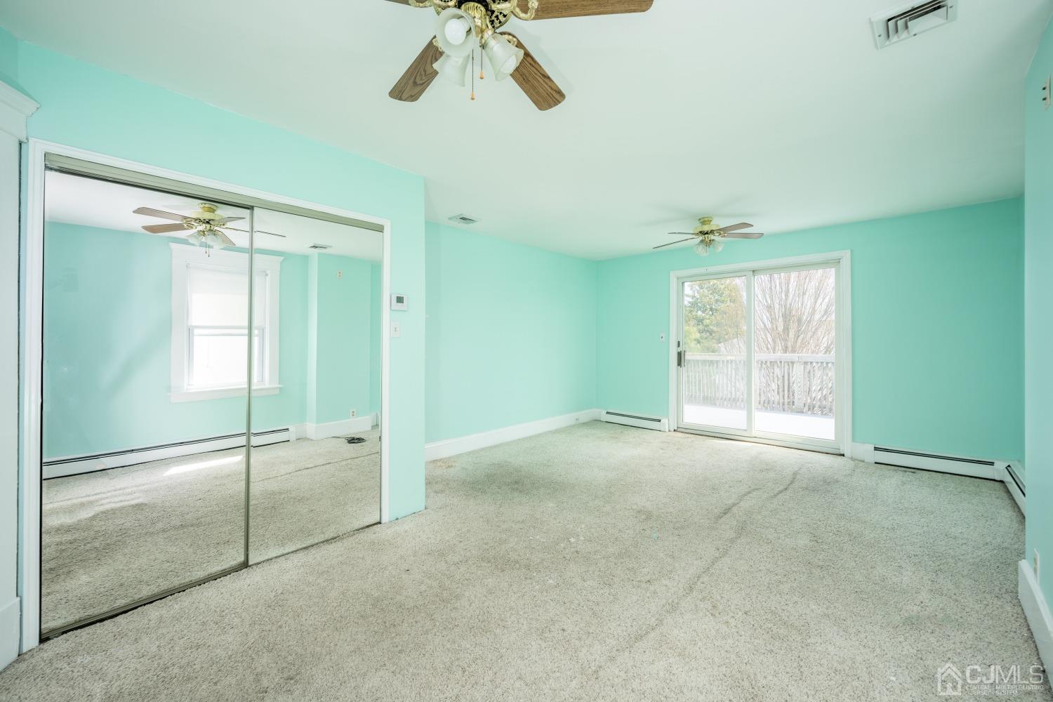 120 Rector Street Perth Amboy, NJ 08861 - Photo 8 of 34 a view of an empty room with a window