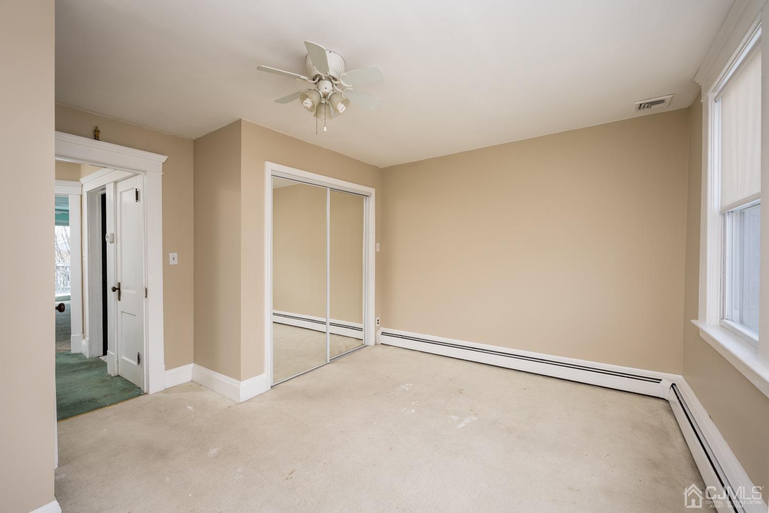 120 Rector Street Perth Amboy, NJ 08861 - Photo 9 of 34 a view of an empty room with a window