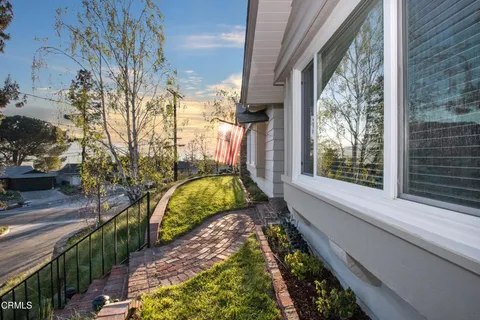 a view of swimming pool from a balcony