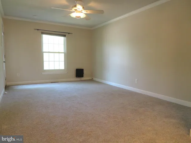 a view of outdoor space with wooden fence