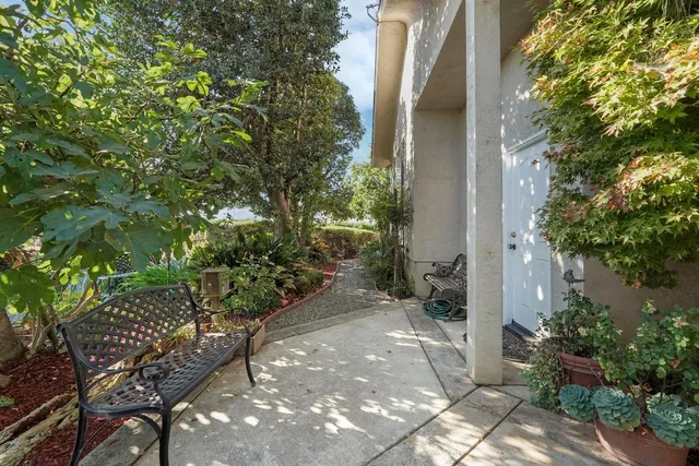 an aerial view of a house with a lake view