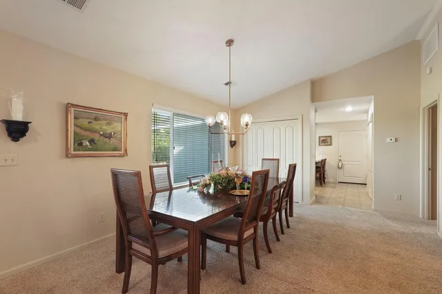 a living room with furniture fireplace and a fireplace