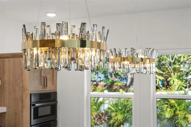 a kitchen with a sink stove and refrigerator