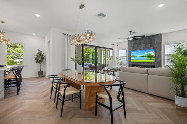 a swimming pool with outdoor seating