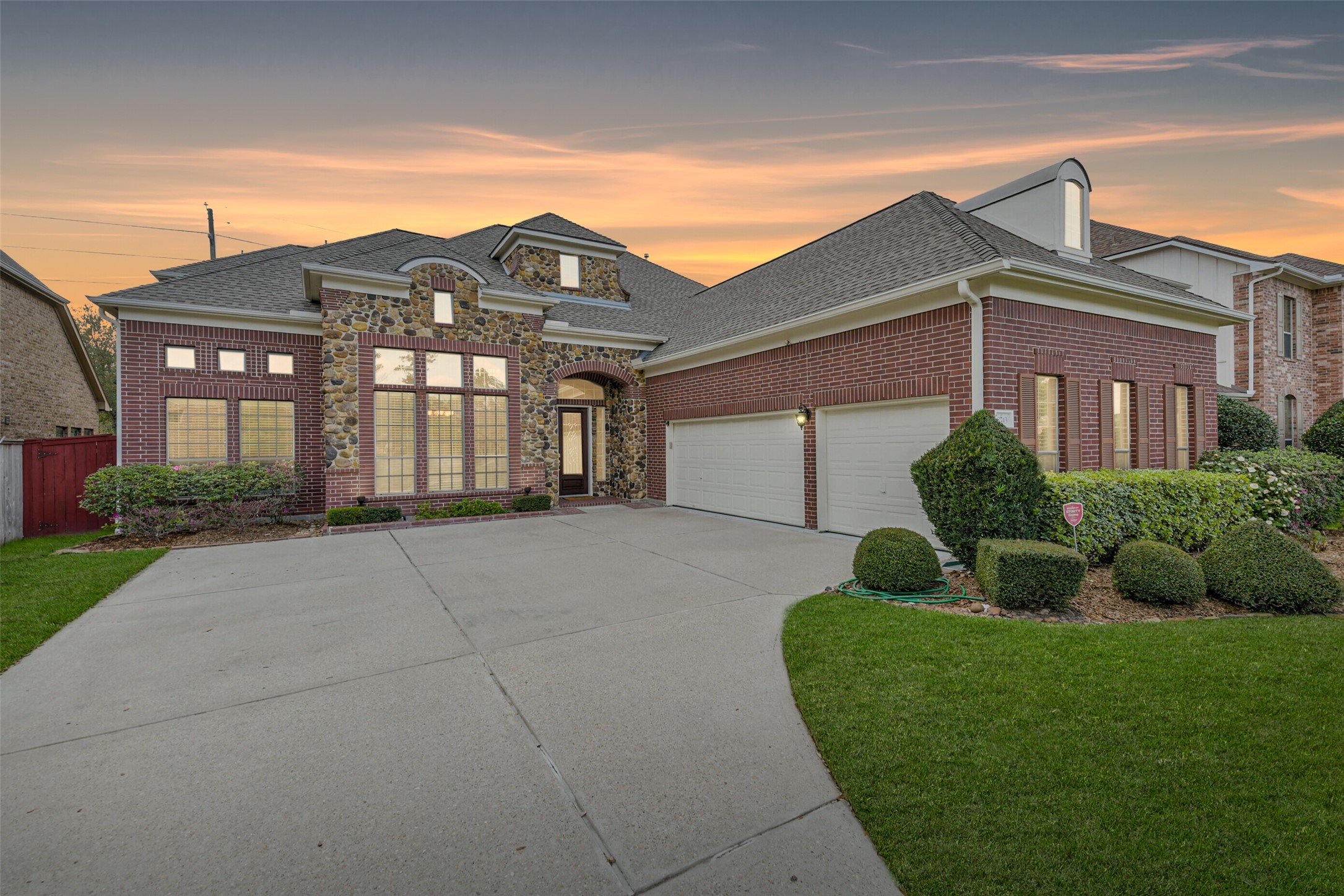 18743 Duke Lake Drive Spring, TX 77388 - Photo 1 of 46 a front view of a house with a garden