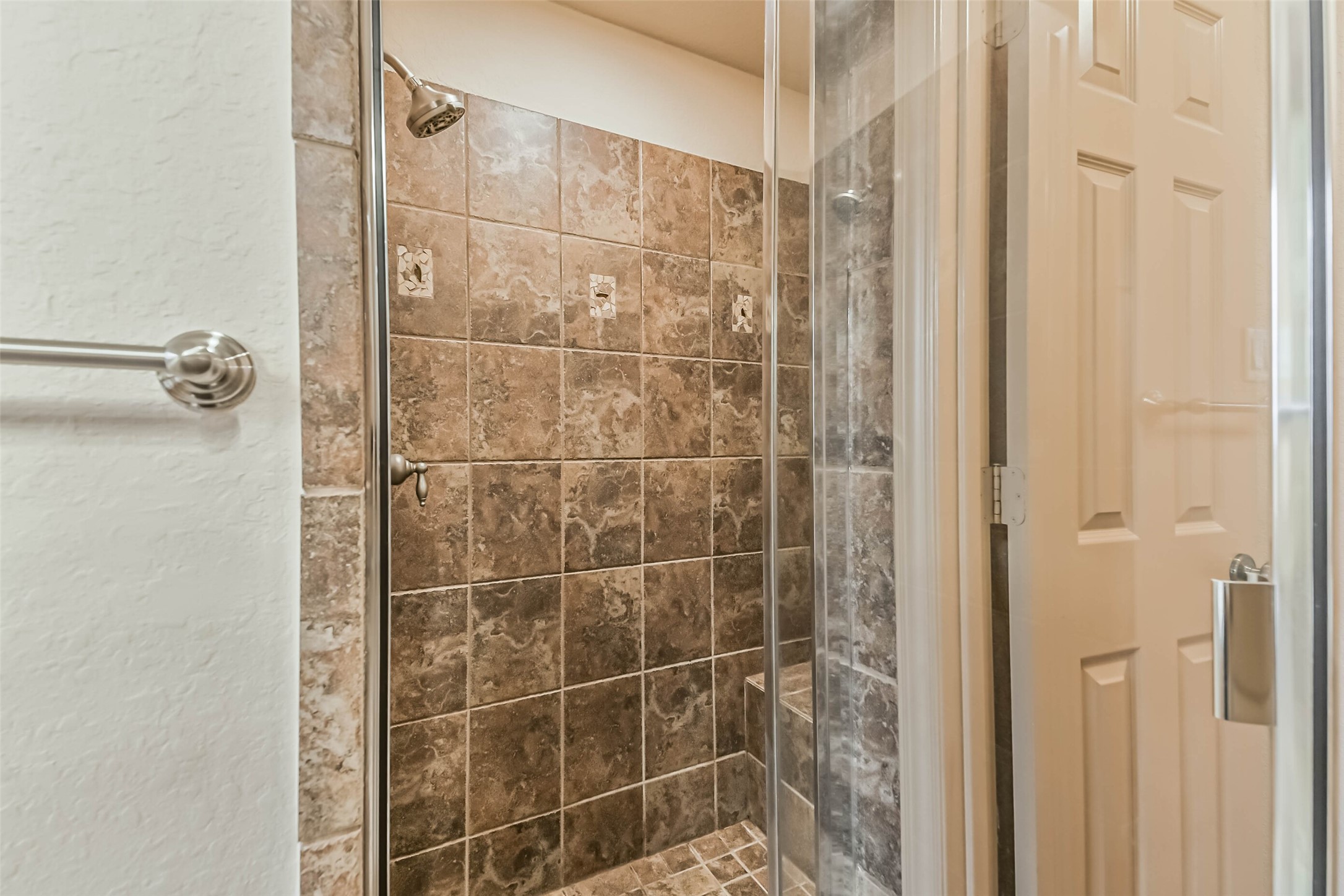18743 Duke Lake Drive Spring, TX 77388 - Photo 21 of 46 a bathroom with a shower and a glass door