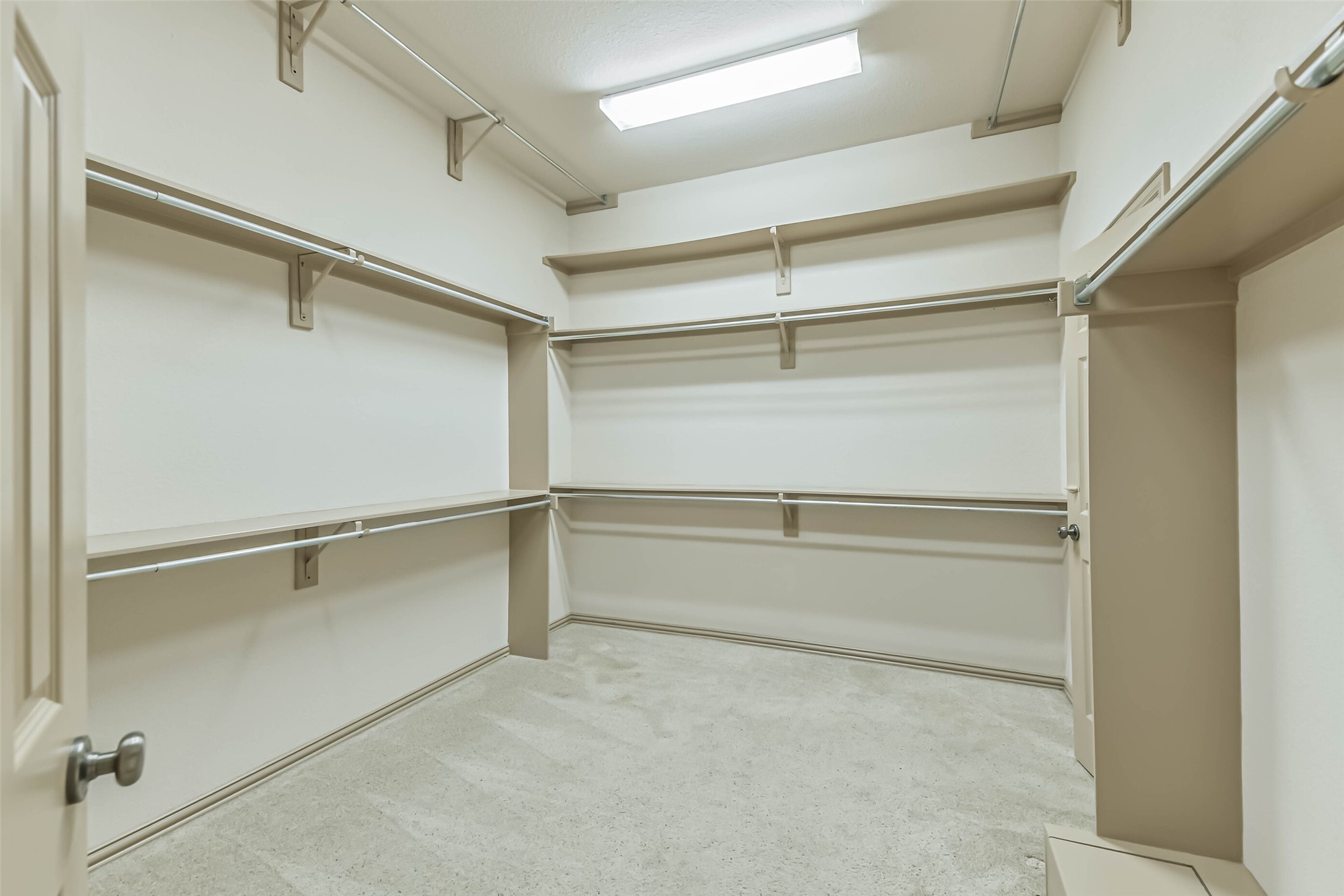 18743 Duke Lake Drive Spring, TX 77388 - Photo 23 of 46 a view of an empty walk in closet