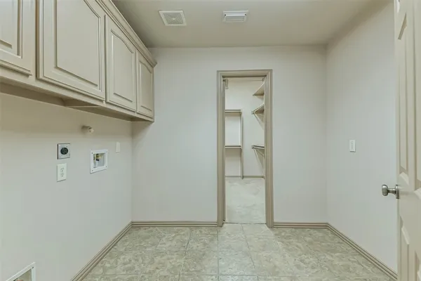 an aerial view of a swimming pool patio and outdoor seating