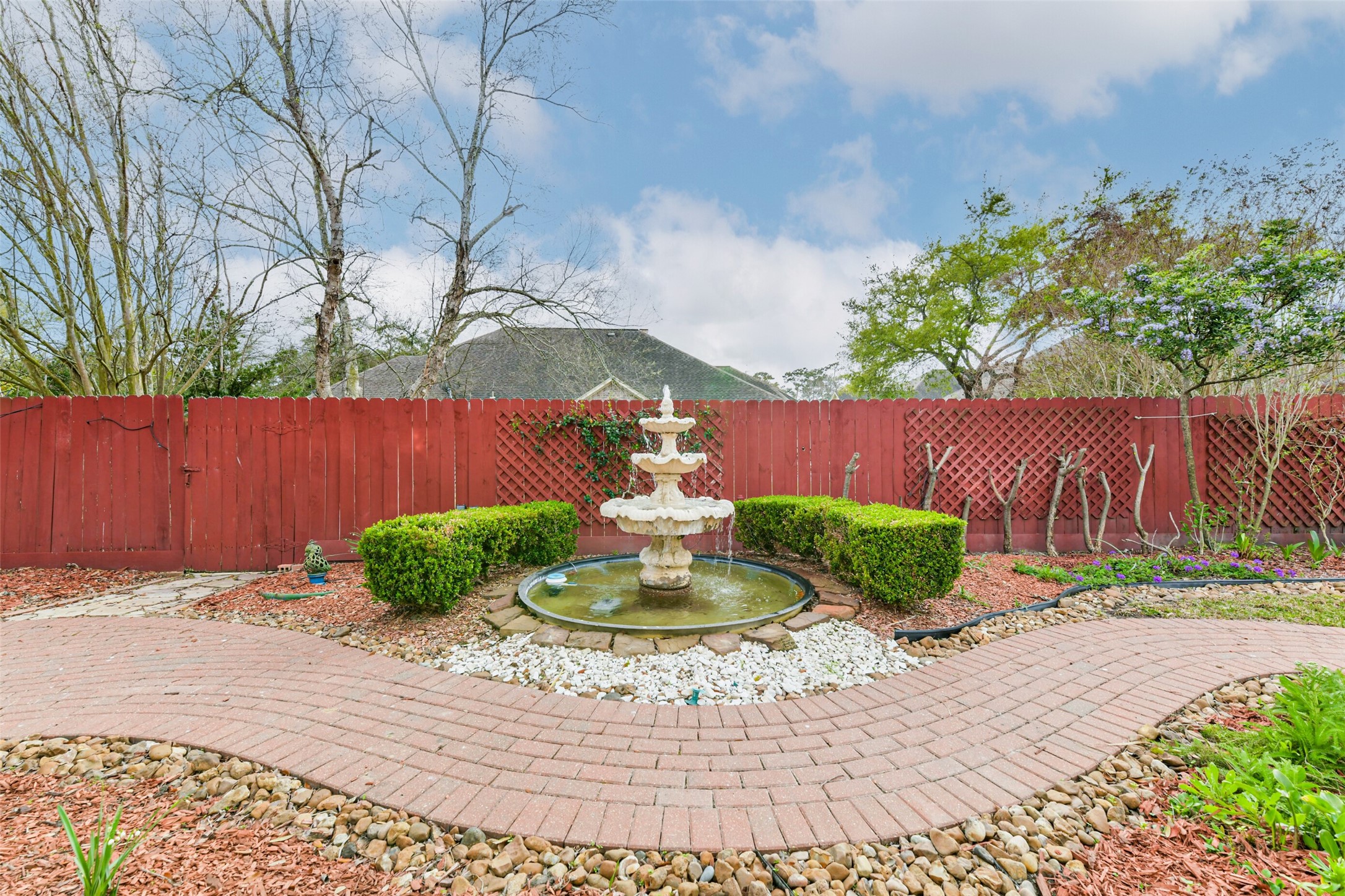 18743 Duke Lake Drive Spring, TX 77388 - Photo 39 of 46 a view of a backyard with a fountain