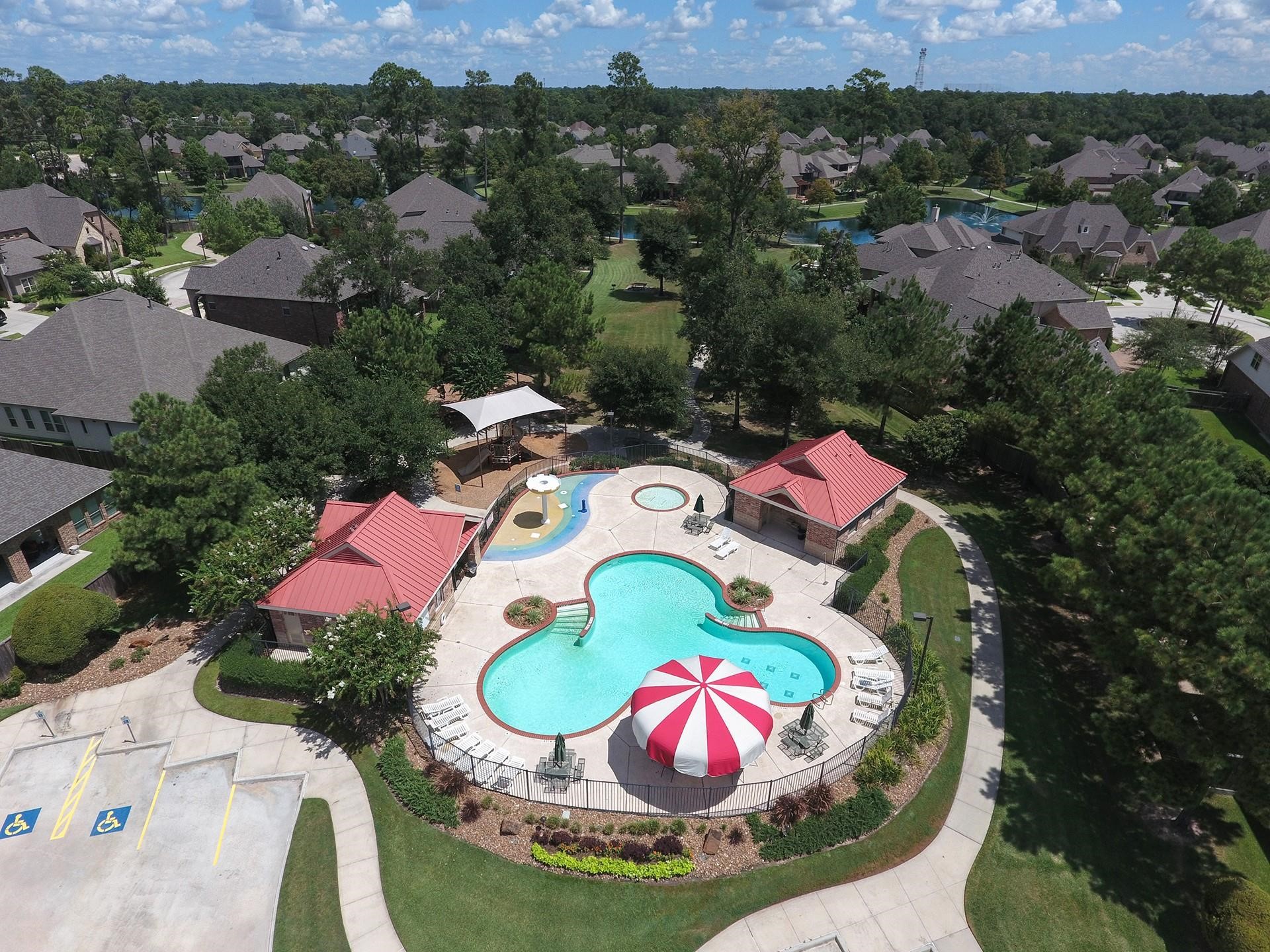 18743 Duke Lake Drive Spring, TX 77388 - Photo 46 of 46 an aerial view of a swimming pool patio and outdoor seating