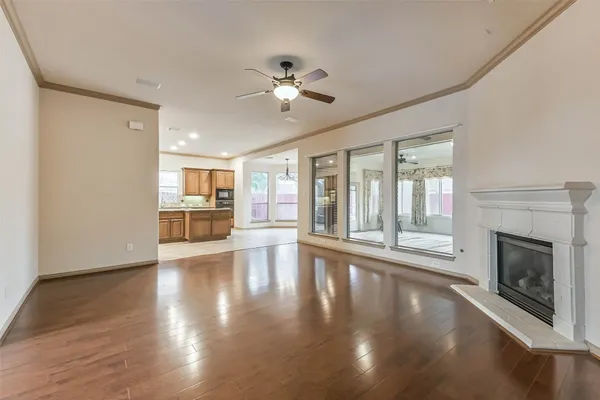 a kitchen with granite countertop a stove and a sink