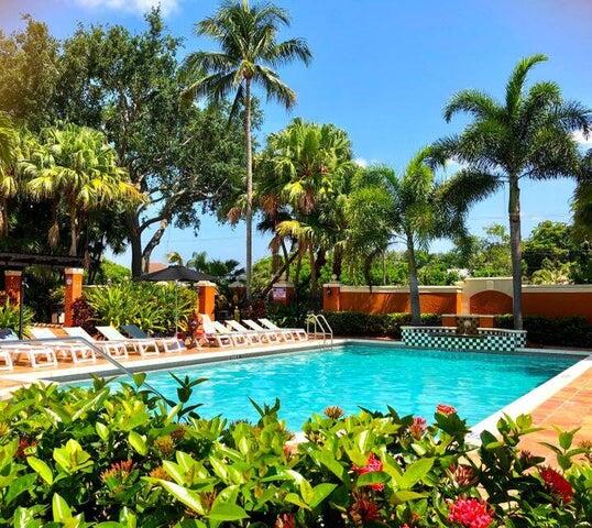 3111 Clint Moore Road, Unit 106 Boca Raton, FL 33496 - Photo 2 of 12 a view of a house with a swimming pool