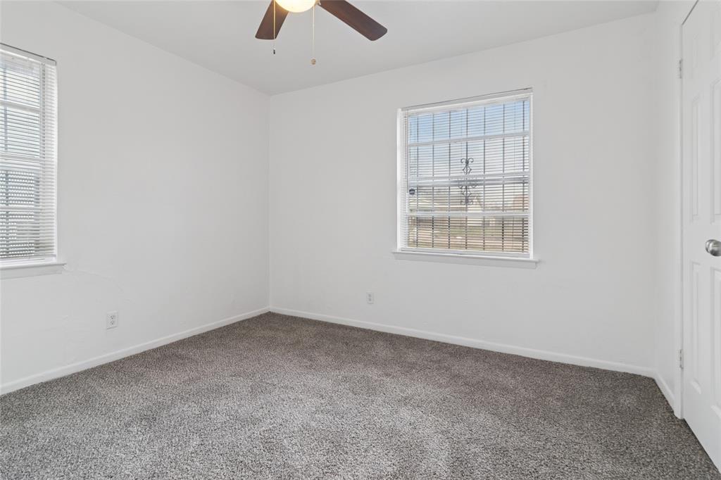 7840 Larchridge Drive Dallas, TX 75232 - Photo 12 of 16 an empty room with a window