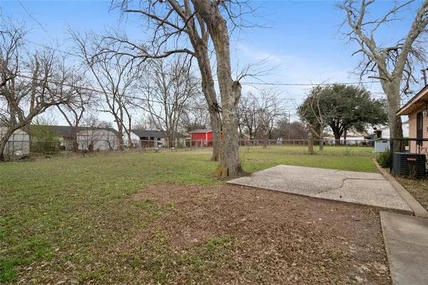 a view of backyard with green space