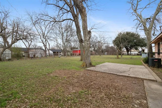 a view of backyard with green space