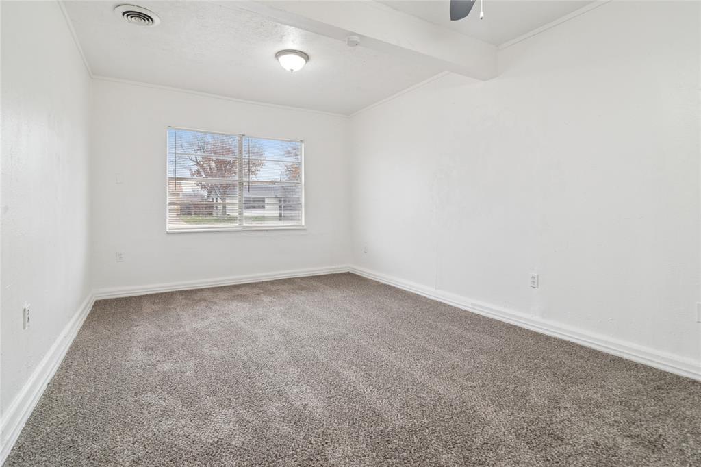 7840 Larchridge Drive Dallas, TX 75232 - Photo 8 of 16 an empty room with a window