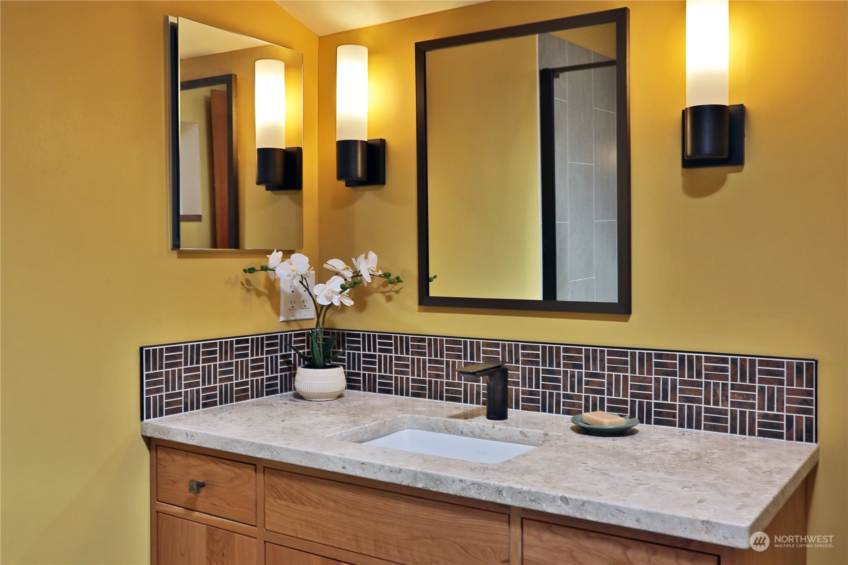 6567 Wahl Road Freeland, WA 98249 - Photo 26 of 40 a bathroom with a granite countertop sink and a mirror