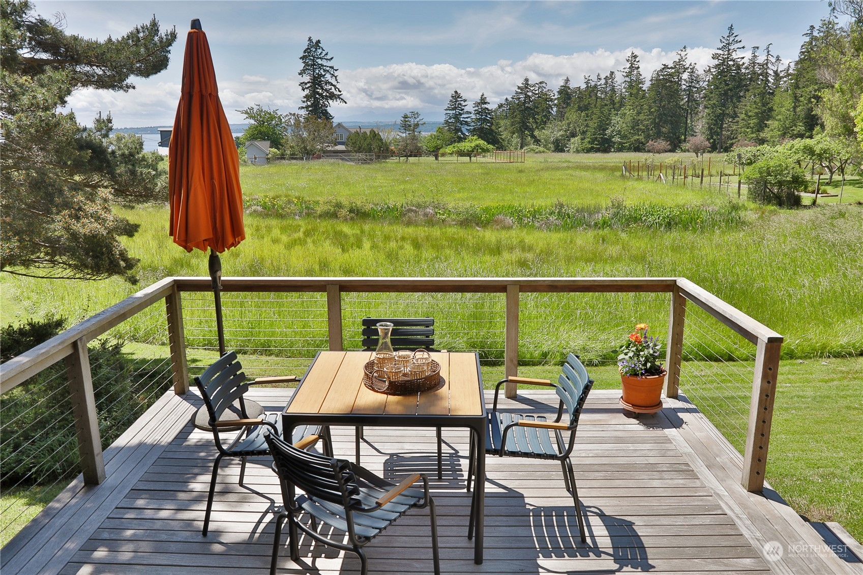 6567 Wahl Road Freeland, WA 98249 - Photo 27 of 40 a view of a chairs and table in the balcony