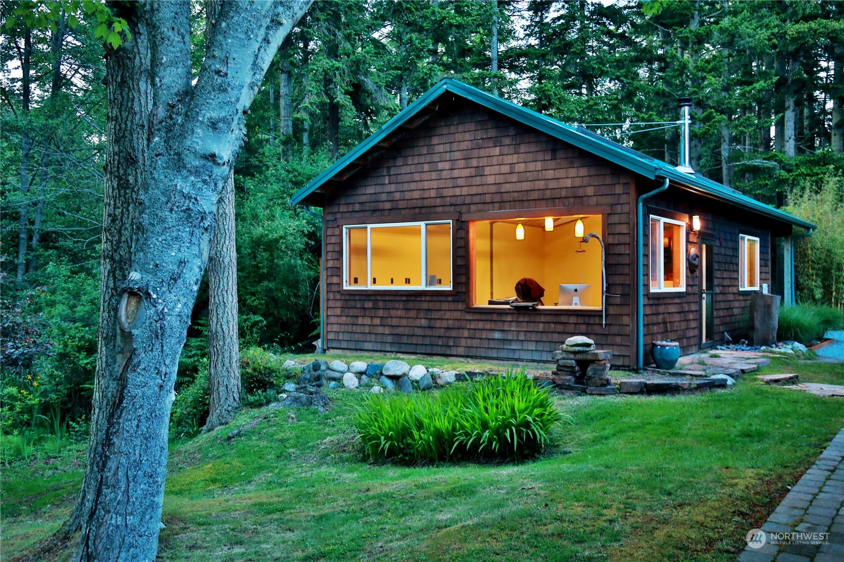 6567 Wahl Road Freeland, WA 98249 - Photo 30 of 40 a view of a house with a yard