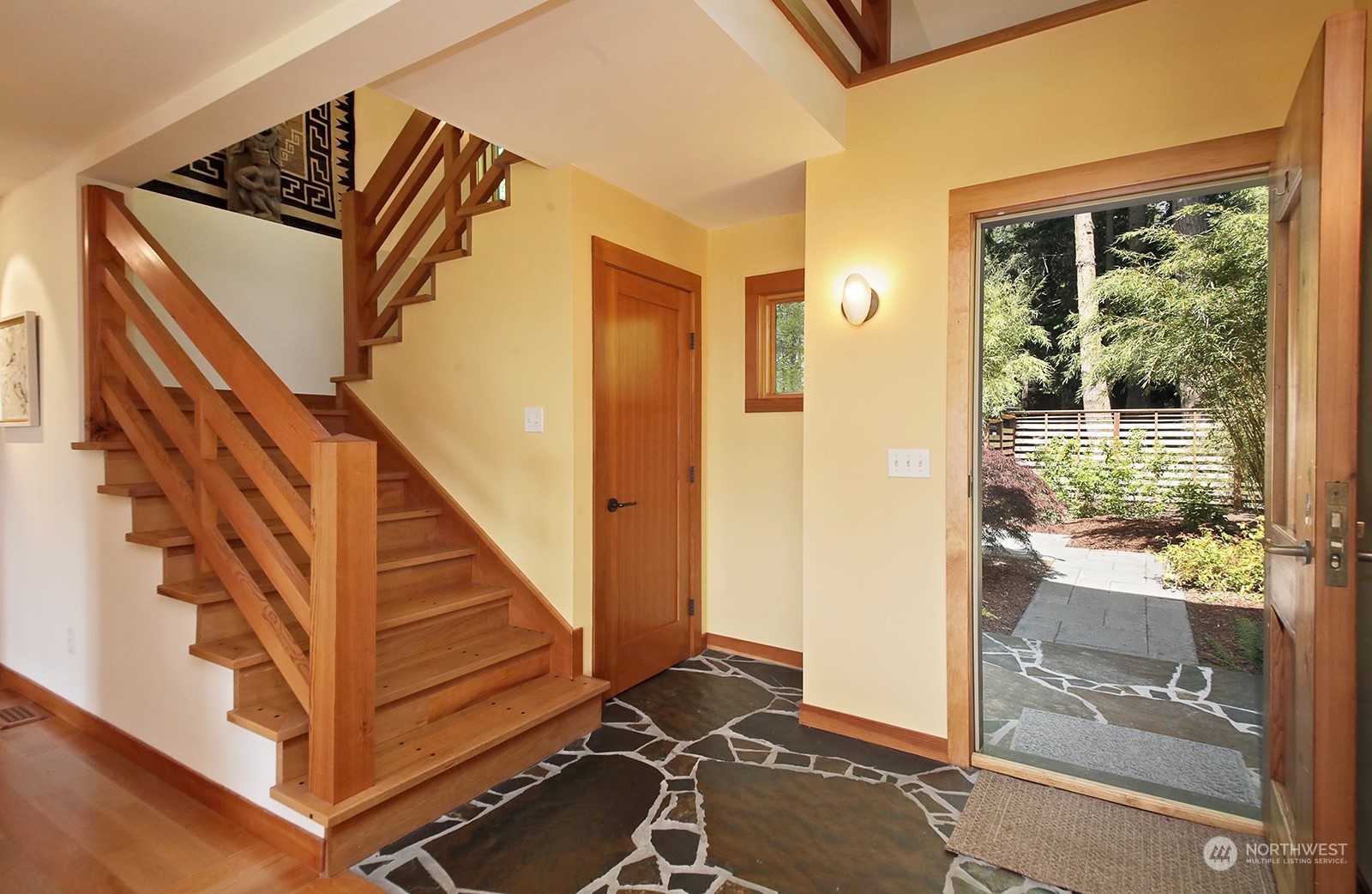 6567 Wahl Road Freeland, WA 98249 - Photo 7 of 40 a view of a livingroom with stairs and furniture