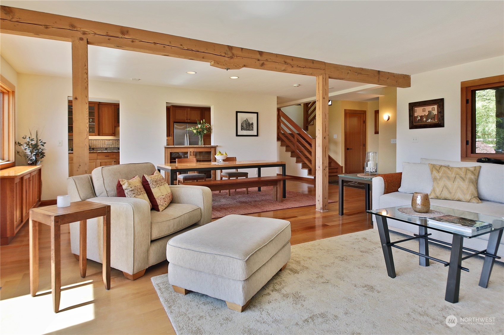 6567 Wahl Road Freeland, WA 98249 - Photo 8 of 40 a living room with furniture and a wooden floor