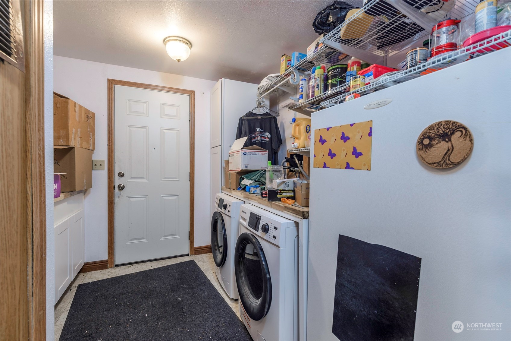 18524 Ivan Street Southwest Rochester, WA 98579 - Photo 13 of 20 a view of a storage & utility room with washer and dryer