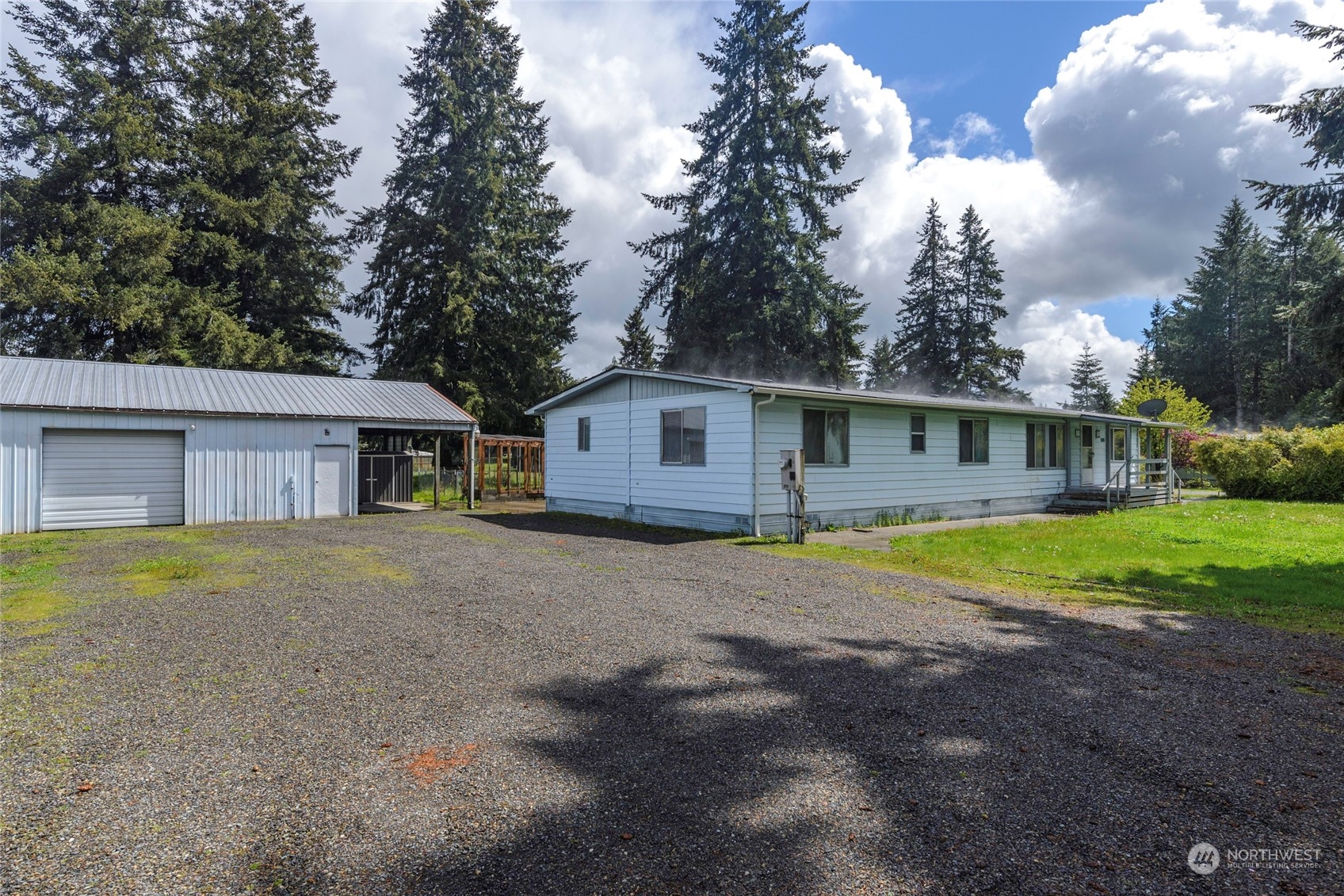 18524 Ivan Street Southwest Rochester, WA 98579 - Photo 2 of 20 a view of a house with pool and a yard