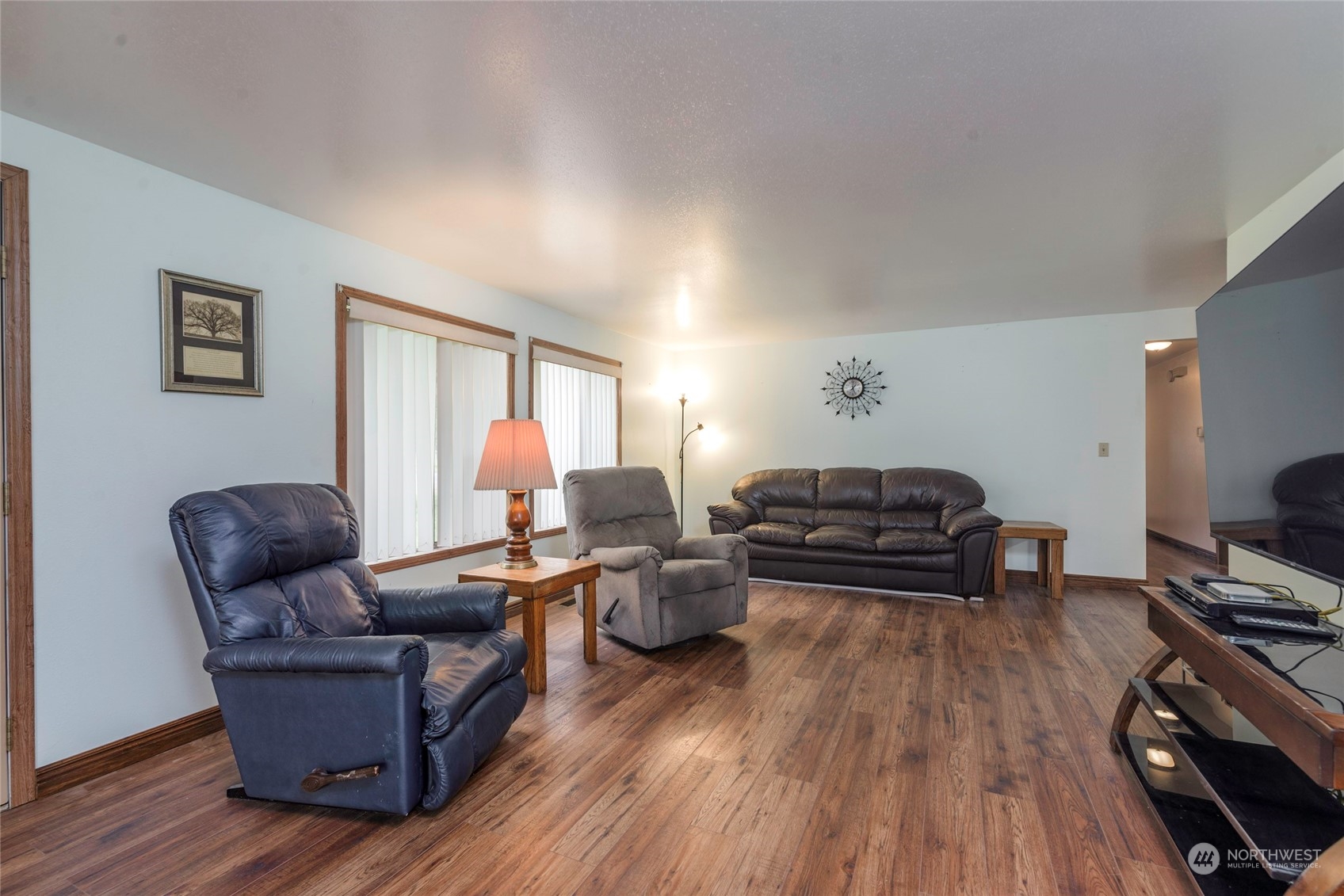 18524 Ivan Street Southwest Rochester, WA 98579 - Photo 4 of 20 a living room with furniture and a flat screen tv