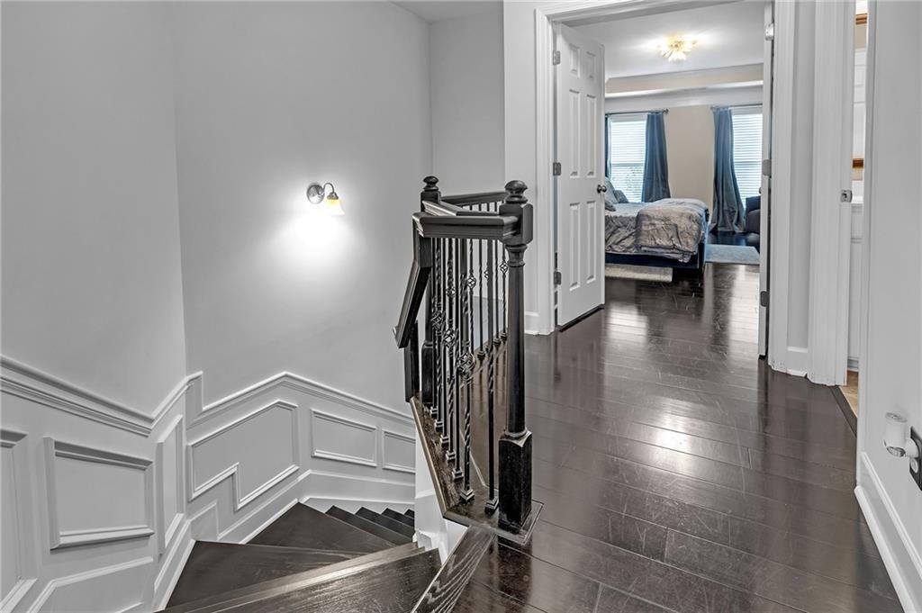 6513 Bennington Bluff Court, Unit 2 Mableton, GA 30126 - Photo 17 of 41 a view of a hallway with entryway wooden floor and windows