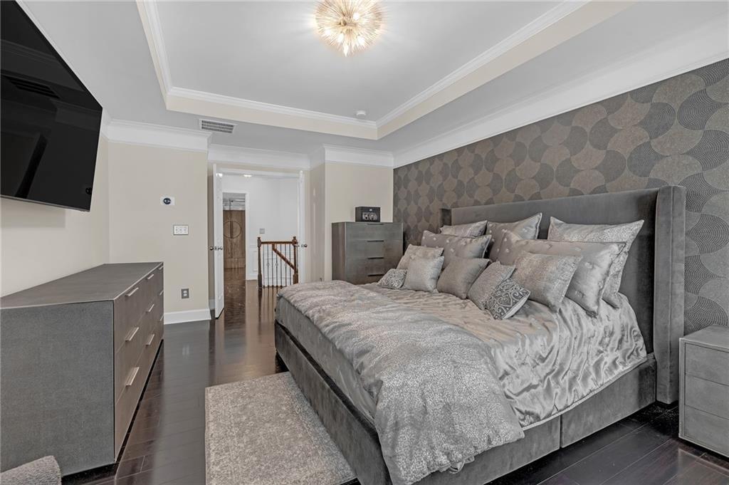 6513 Bennington Bluff Court, Unit 2 Mableton, GA 30126 - Photo 19 of 41 a bed room with a bed and a television