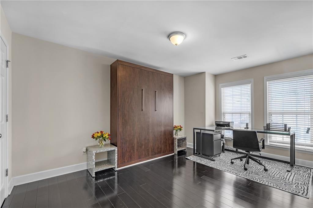 6513 Bennington Bluff Court, Unit 2 Mableton, GA 30126 - Photo 25 of 41 a view of a workspace with furniture and a window