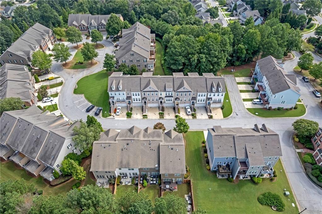 6513 Bennington Bluff Court, Unit 2 Mableton, GA 30126 - Photo 33 of 41 an aerial view of multiple houses with yard