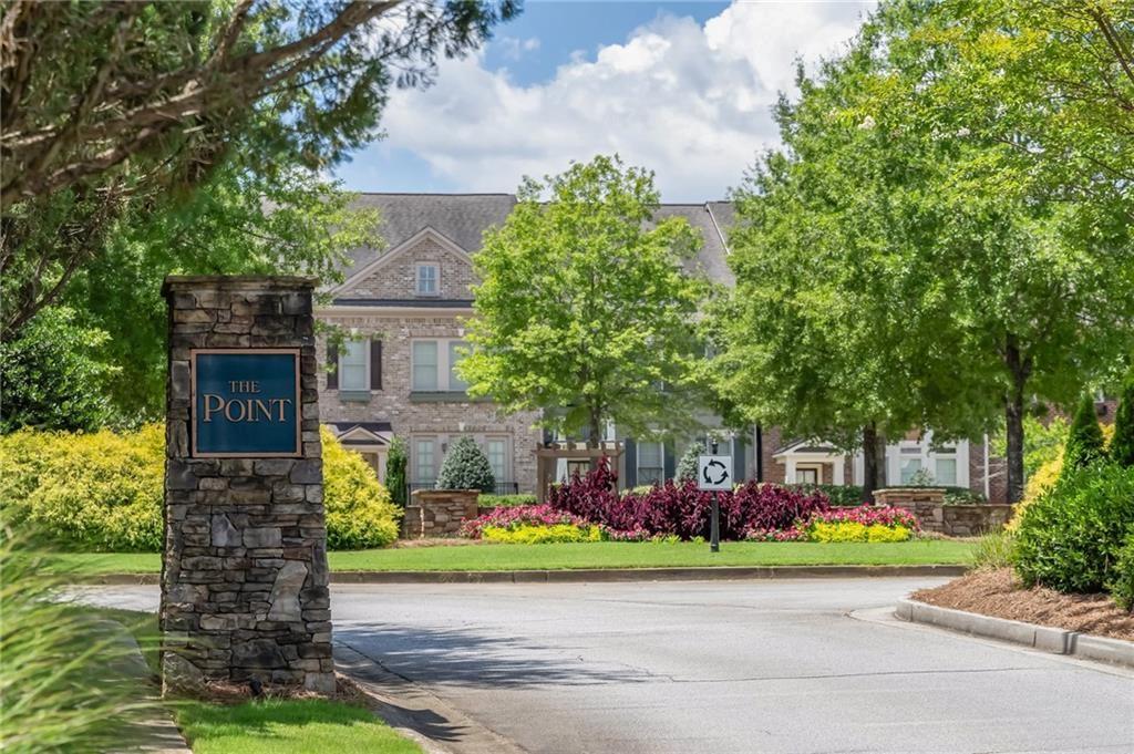 6513 Bennington Bluff Court, Unit 2 Mableton, GA 30126 - Photo 37 of 41 a front view of a house with a yard and a garage