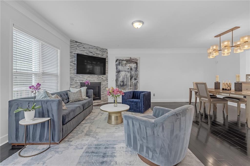 6513 Bennington Bluff Court, Unit 2 Mableton, GA 30126 - Photo 4 of 41 a living room with furniture and a flat screen tv