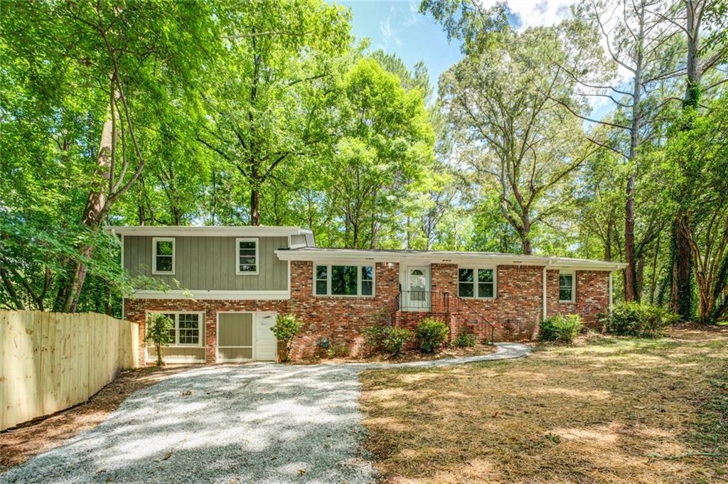 8251 Lakeview Drive Southwest Covington, GA 30014 - Photo 1 of 1 front view of a house with a patio