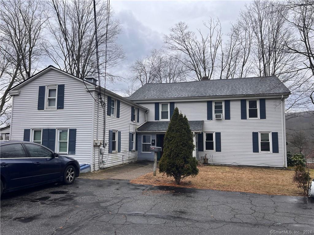 551 North Main Street, Unit 1R Naugatuck, CT 06770 - Photo 1 of 13 a front view of a house with a yard