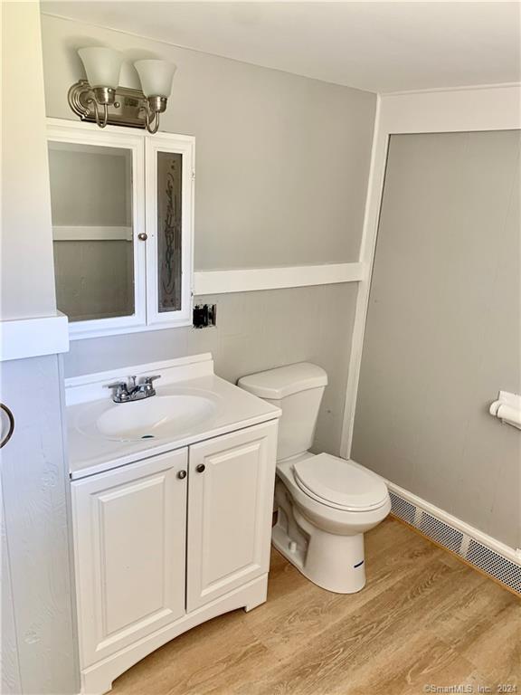 551 North Main Street, Unit 1R Naugatuck, CT 06770 - Photo 12 of 13 a bathroom with a sink toilet and vanity